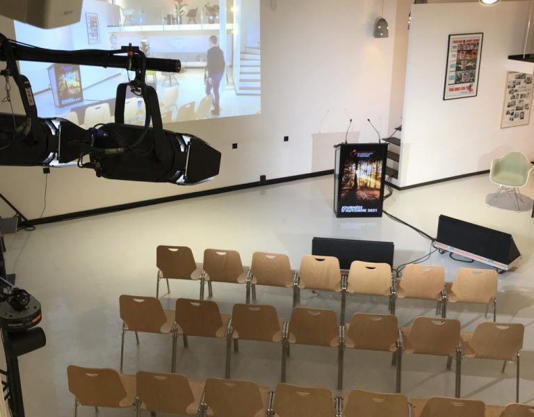 Salle de conférence moderne équipée pour séminaires d’entreprise – organisation d’événements professionnels à Genève par une agence événementielle spécialisée